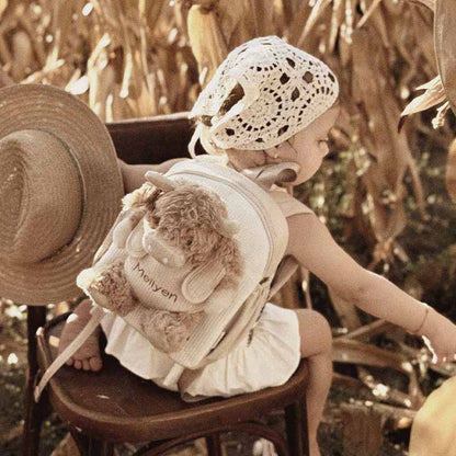 Moonkie Hug & Go™ Logan the Highland Cow